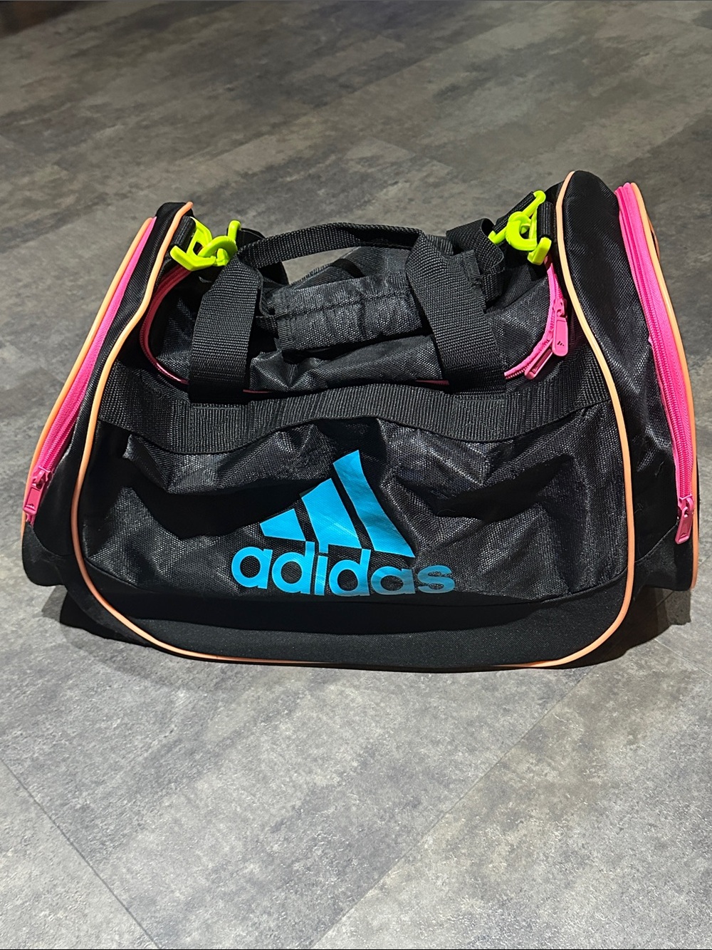 Adidas Black Duffel Bag with Blue Logo and Pink & Neon Accents